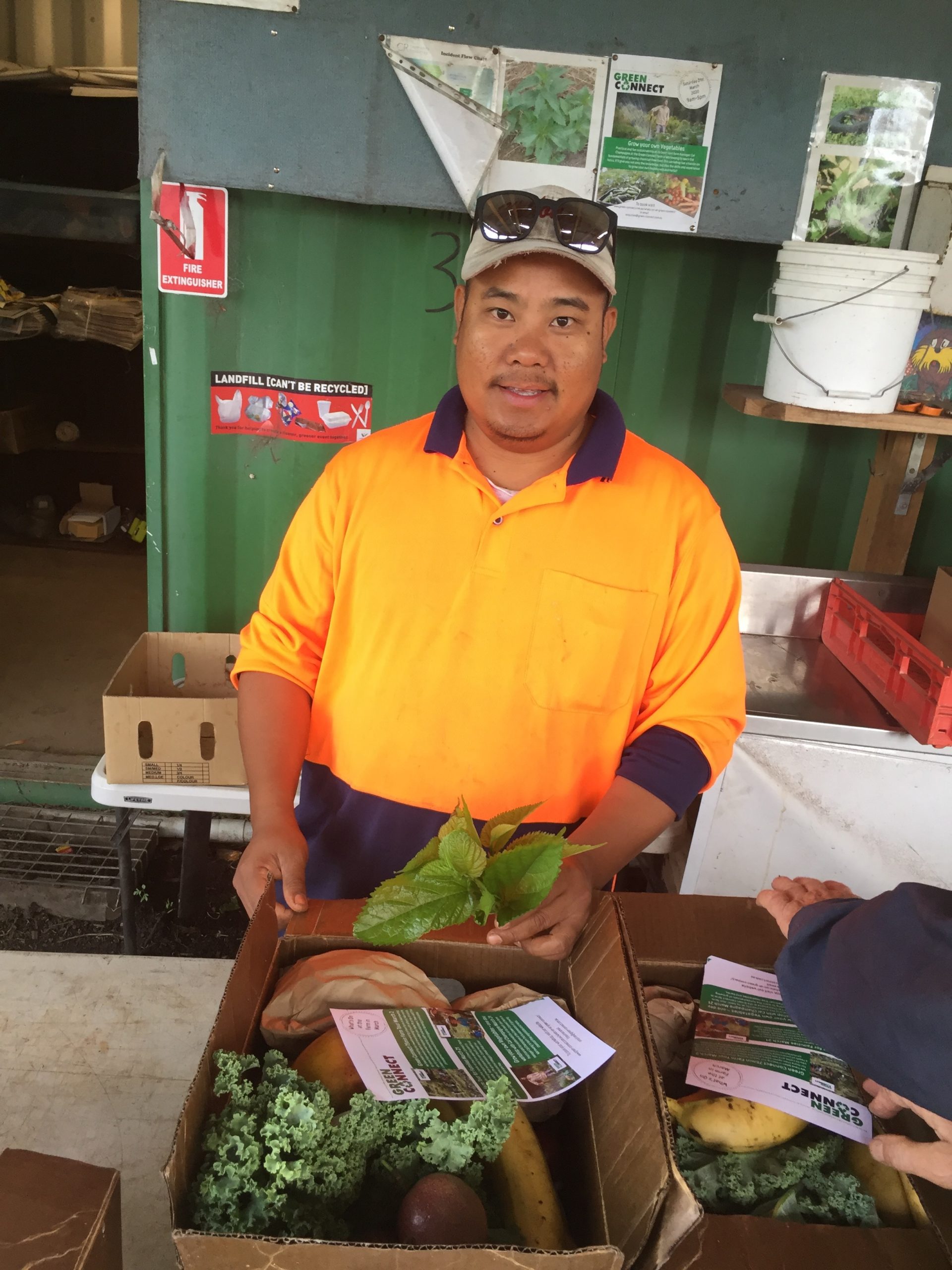 Shay Ray Green Connect Farm worker with Green Connect veg box