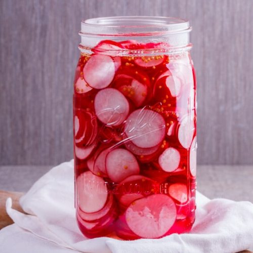 Pickeled radishes in jar with no lid