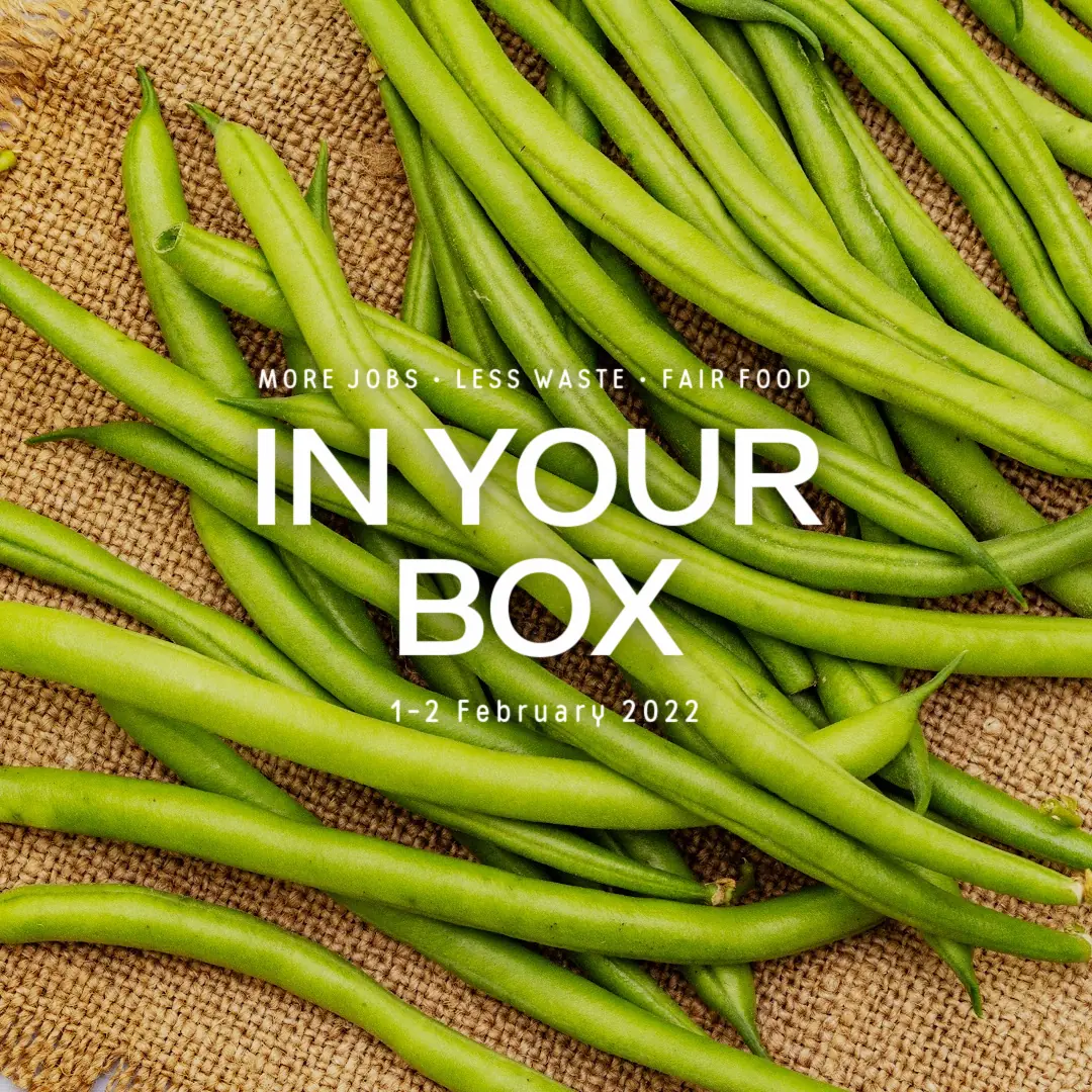 Cover photo with 'In Your Box', '1-2 February 2022' written and green beans on heshan fabric in background