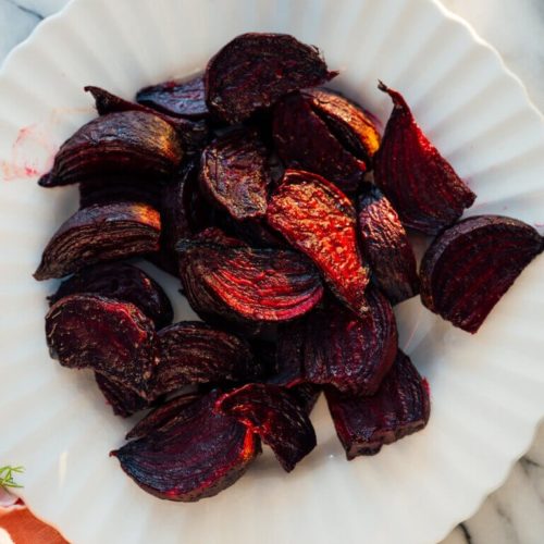Roasted beetroot on white plate
